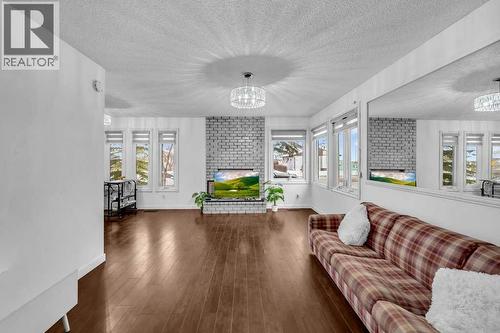 1140 Abbeydale Drive Ne, Calgary, AB - Indoor Photo Showing Living Room