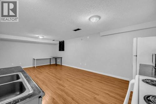 1140 Abbeydale Drive Ne, Calgary, AB - Indoor Photo Showing Kitchen With Double Sink