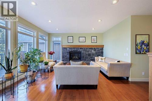 118 Tusslewood Heights Nw, Calgary, AB - Indoor Photo Showing Living Room With Fireplace