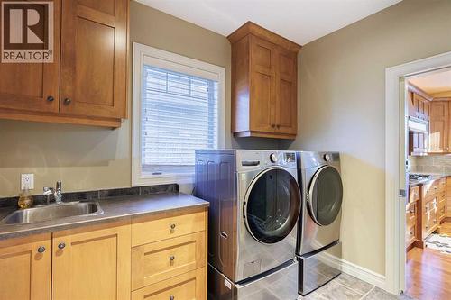118 Tusslewood Heights Nw, Calgary, AB - Indoor Photo Showing Laundry Room