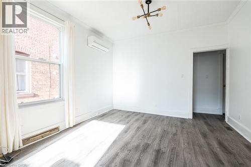 Unit #1's living room. - 388 Charlton Avenue W, Hamilton, ON - Indoor Photo Showing Other Room
