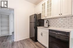 Both units' kitchens feature dishwashers. - 