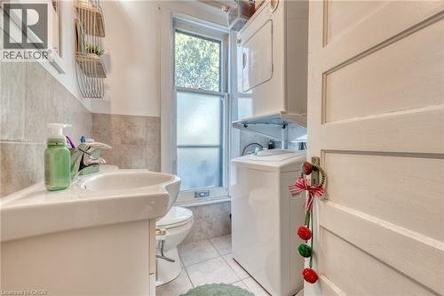 Full bathroom with a walk-in shower, and private in-suite laundry. - 388 Charlton Avenue W, Hamilton, ON - Indoor