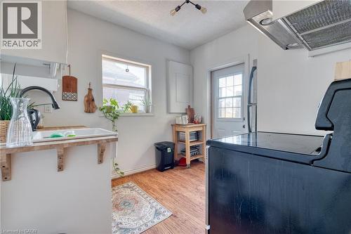 The backdoor leads to unit #2's private second-floor deck. - 388 Charlton Avenue W, Hamilton, ON - Indoor