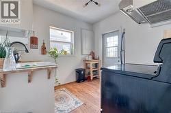 The backdoor leads to unit #2's private second-floor deck. - 