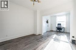 Soaring 9-foot high ceilings, and a large south-facing window allowing for maximum natural light. - 