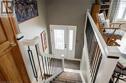 Entrance foyer featuring stairway - 