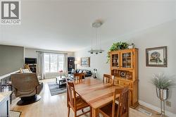 Dining room featuring light wood-style floors - 