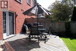 Wooden deck with outdoor dining area - 