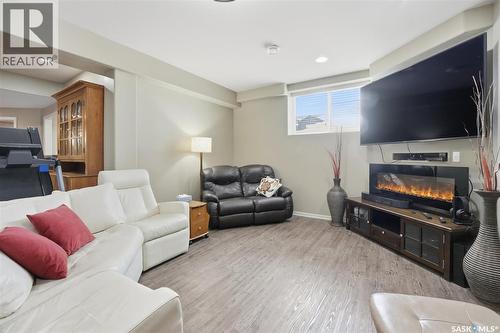 327 Hastings Lane, Saskatoon, SK - Indoor Photo Showing Living Room With Fireplace