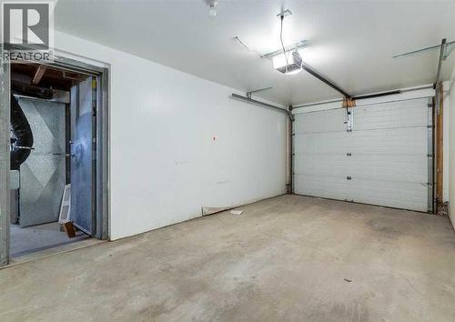 77 Mckenzie Towne Gate Se, Calgary, AB - Indoor Photo Showing Garage