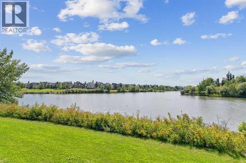 77 Mckenzie Towne Gate Se, Calgary, AB - Outdoor With Body Of Water With View
