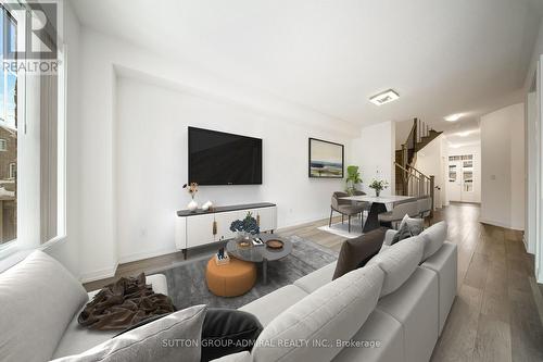 This photo has been virtually staged. - 217 Bennett Street, Newmarket, ON - Indoor Photo Showing Living Room