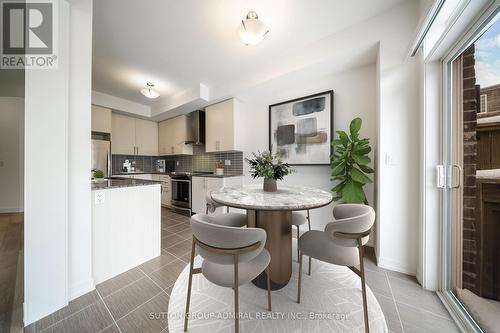 This photo has been virtually staged. - 217 Bennett Street, Newmarket, ON - Indoor Photo Showing Dining Room