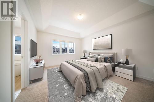This photo has been virtually staged. - 217 Bennett Street, Newmarket, ON - Indoor Photo Showing Bedroom