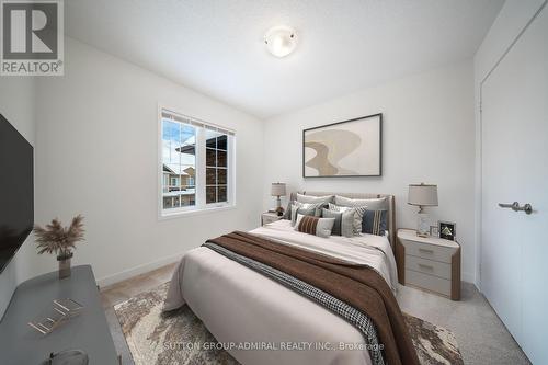 This photo has been virtually staged. - 217 Bennett Street, Newmarket, ON - Indoor Photo Showing Bedroom