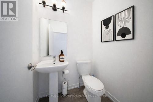 This photo has been virtually staged. - 217 Bennett Street, Newmarket, ON - Indoor Photo Showing Bathroom