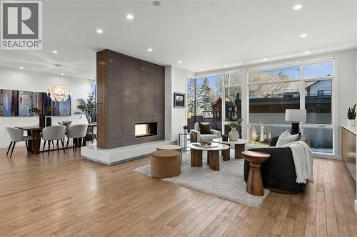 3216 5 Street Nw, Calgary, AB - Indoor Photo Showing Living Room With Fireplace