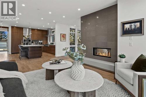 3216 5 Street Nw, Calgary, AB - Indoor Photo Showing Living Room With Fireplace