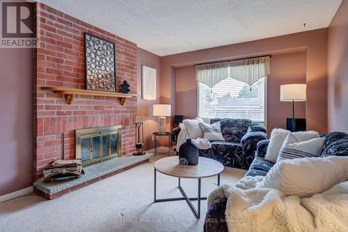 2055 Hunters Wood Drive, Burlington, ON - Indoor Photo Showing Living Room With Fireplace