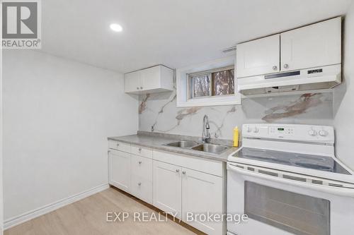 16 Ainslie Avenue, Hamilton, ON - Indoor Photo Showing Kitchen With Double Sink