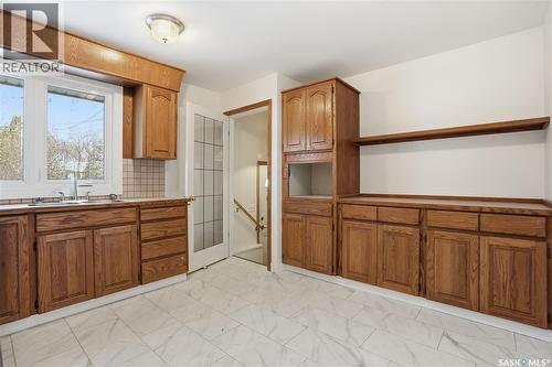 4214 Richmond Place, Regina, SK - Indoor Photo Showing Kitchen With Double Sink