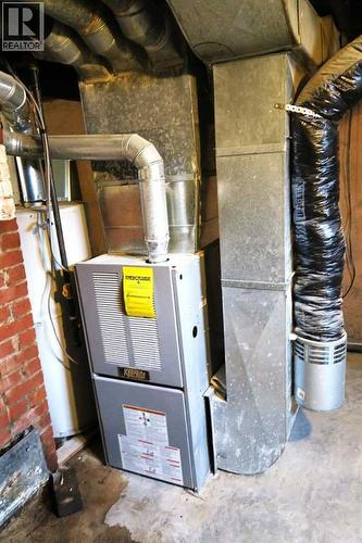 Newer Furnace. & NEW Hot Water Tank - 407 4 Avenue, Gleichen, AB - Indoor Photo Showing Basement