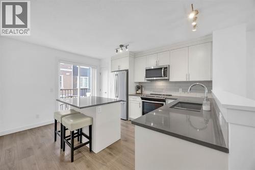 Kitchen - 623 Cranbrook Walk Se, Calgary, AB - Indoor Photo Showing Kitchen With Stainless Steel Kitchen With Upgraded Kitchen