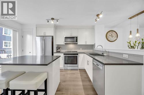 Kitchen - 623 Cranbrook Walk Se, Calgary, AB - Indoor Photo Showing Kitchen With Stainless Steel Kitchen With Upgraded Kitchen