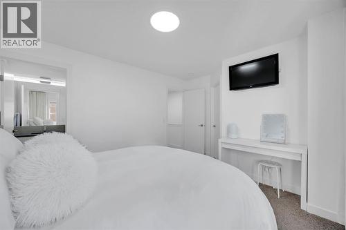 Primary Bedroom #1 - 623 Cranbrook Walk Se, Calgary, AB - Indoor Photo Showing Bedroom