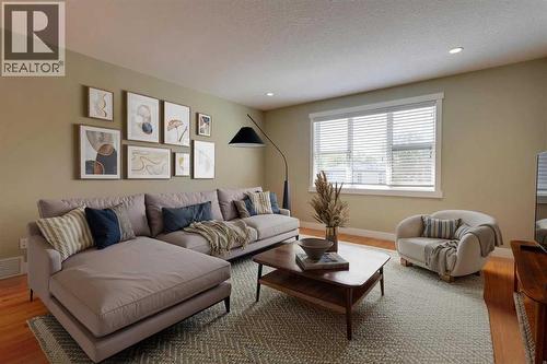Loft - Virtually Staged - 417 29 Avenue Nw, Calgary, AB - Indoor Photo Showing Living Room