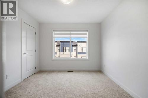 302, 550 Seton Circle Se, Calgary, AB - Indoor Photo Showing Other Room