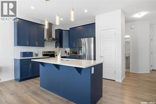 3033 Bellegarde Crescent, Regina, SK - Indoor Photo Showing Kitchen With Stainless Steel Kitchen With Upgraded Kitchen