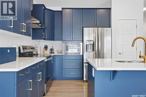 3033 Bellegarde Crescent, Regina, SK - Indoor Photo Showing Kitchen With Upgraded Kitchen