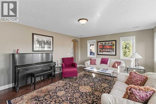 Bonus Room upper - 41 Evergreen Mount Sw, Calgary, AB - Indoor Photo Showing Living Room