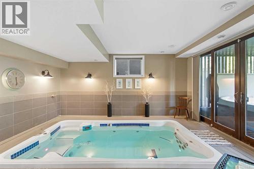 Pool Room - 41 Evergreen Mount Sw, Calgary, AB - Indoor Photo Showing Other Room With In Ground Pool