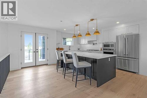 KITCHEN - 340 West Chestermere Drive, Chestermere, AB - Indoor Photo Showing Kitchen With Upgraded Kitchen