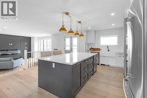 340 West Chestermere Drive, Chestermere, AB - Indoor Photo Showing Kitchen With Upgraded Kitchen