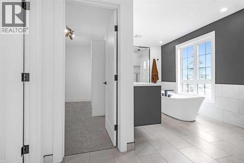 PRIMARY BEDROOM ENSUITE - 340 West Chestermere Drive, Chestermere, AB - Indoor