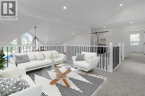 UPPER FLOOR FLEX AREA - 340 West Chestermere Drive, Chestermere, AB - Indoor Photo Showing Living Room