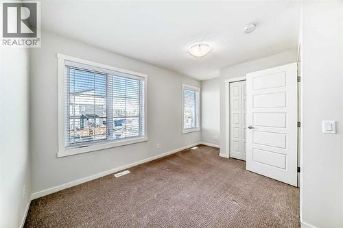 307, 474 Seton Circle Se, Calgary, AB - Indoor Photo Showing Other Room