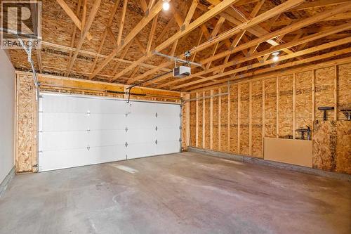 63 Masters Crescent Se, Calgary, AB - Indoor Photo Showing Garage