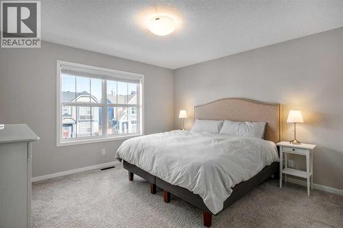 63 Masters Crescent Se, Calgary, AB - Indoor Photo Showing Bedroom