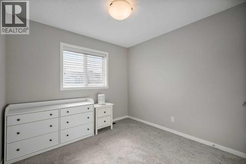 63 Masters Crescent Se, Calgary, AB - Indoor Photo Showing Bedroom
