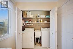 Laundry area featuring independent washer and dryer - 
