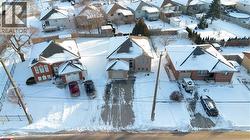 Snowy aerial view with a residential view - 