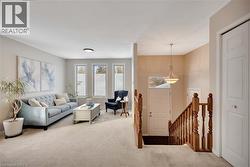 Living room featuring carpet - 