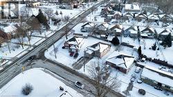 Snowy aerial view featuring a residential view - 