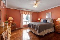 Second bedroom with oak flooring - 