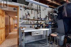 Lower level workshop; includes woodstove - 